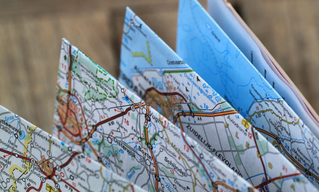 A folded map representing guidance and reflection, symbolizing the process of rebuilding trust in therapy.