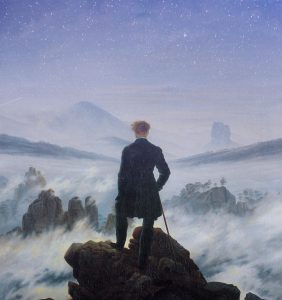 A lone figure stands on a rocky cliff above the clouds under a starry night sky, symbolizing how to practice acceptance while facing life's uncertainty.