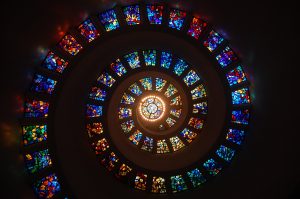 Spiral of stained glass panels illustrating the fragmented identity of borderline personality disorder